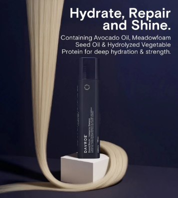 Hair care product with text about hydration, repair, and shine on a dark background