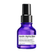 A bottle of Serie Expert Keratin Alpha Sleek serum, featuring a vibrant cobalt blue glass bottle with a black spray nozzle and a white label.
