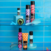 Collection of hair care products on a blue tiled shelf
