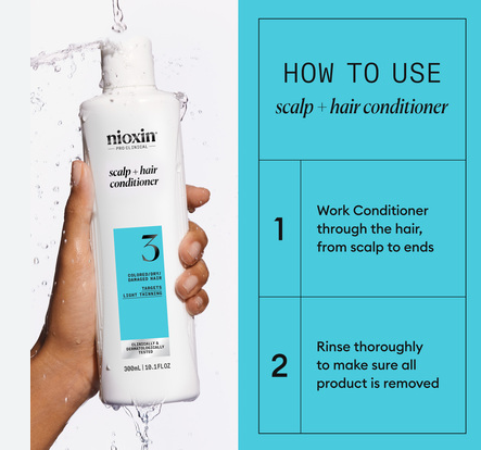 Nioxin scalp and hair conditioner bottle held by a hand with usage instructions on a blue background
