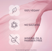 A pink promotional graphic with three white cloud-like icons and text reading '100% VEGAN*', 'NO SULFATES', and 'MINERAL OIL & PARABEN-FREE' on a soft pink abstract background.