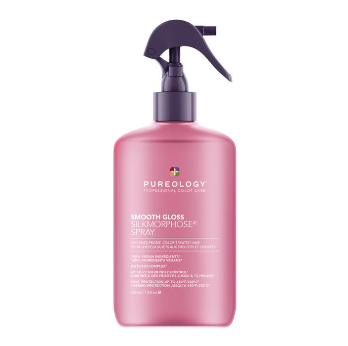 A pink bottle of Pureology Smooth Gloss SilkMorphose Spray with a dark purple trigger sprayer, set against a solid white background.