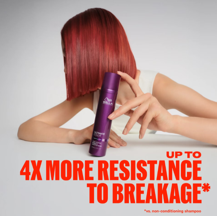 A person with bright red hair holds a purple bottle of Hairsicle Extreme Breakage Resistant Shampoo against their face in a stylized pose. Large red text at the bottom reads 'UP TO 4X MORE RESISTANCE TO BREAKAGE'.