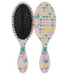 Hairbrush with heart pattern on a white background